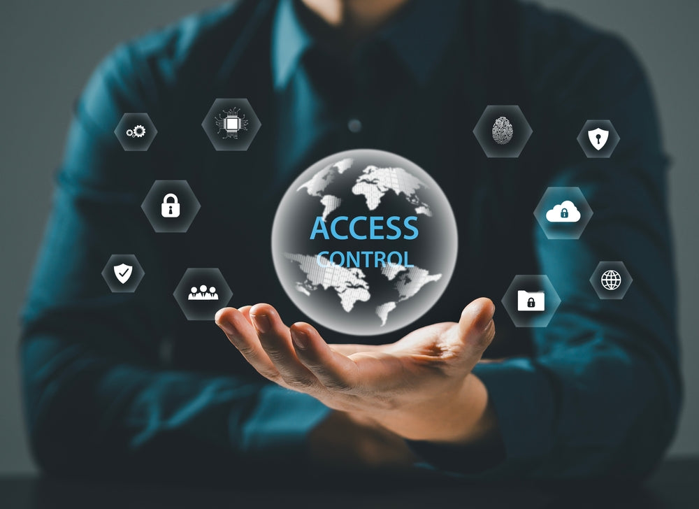 Person securing networked access control system using RFID proximity card with encrypted credentials.