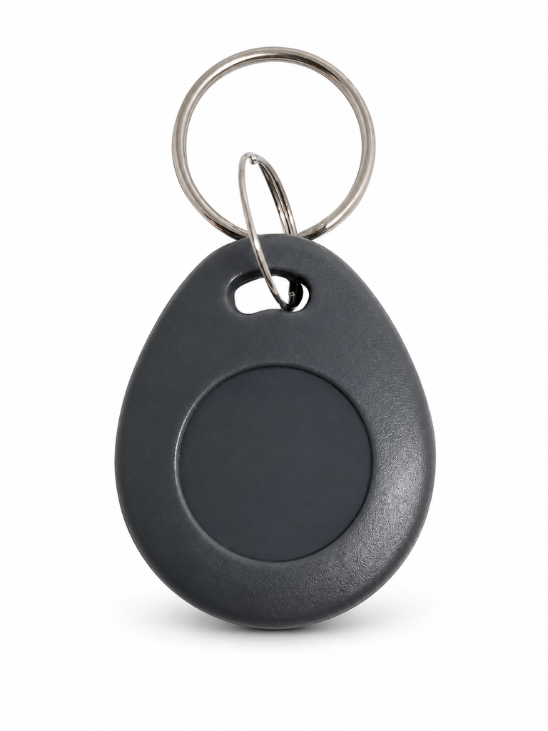 AuthorizID Corporate 1000 35-Bit 125kHz proximity key fob front face view showing dark grey teardrop ABS housing with circular recessed face and key ring attached.